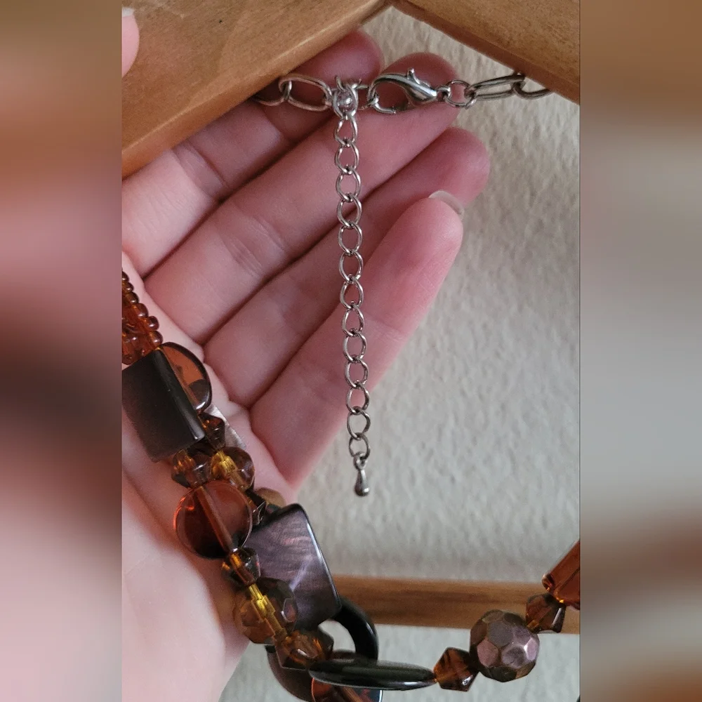 Multi strand silver and amber beaded necklace